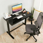 Uncaged Ergonomics Rise Up Glass Electric Height Adjustable Sit/Stand Desk - Black-Dimensions: 45.5"W x 28.5"-46.3"H x 23.7"D