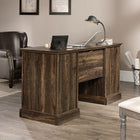 Sauder 59"W Barrister Lane Executive Desk - Iron Oak- Adjustable shelf behind door