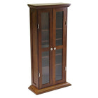 Winsome DVD/CD Cabinet, Antique Walnut-Elegantly styled with traditional profiled trim and deep stain.  5 adjustable shelves offer storage for up to 135 DVDs, 205 CDs or 75 videocassettes. Comes with glass door inserts and satin nickel-finish metal hardware. Warm Walnut Finish.