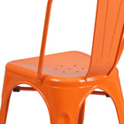Flash Furniture Orange Metal Indoor-Outdoor Stackable Chair-Drain Holes in Seat