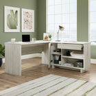 Sauder 60"W Porto Palma Desk - Haze Acacia-Hidden storage behind door features an adjustable shelf.