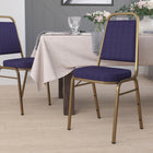 Flash Furniture HERCULES Series Trapezoidal Back Stacking Banquet Chair in Navy Patterned Fabric - Gold Frame-Upholstered Seat and Back