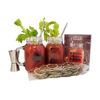 Dolce & Gourmando Bloody Mary Gift Set-It includes two chunky mason jars glasses with handles, citrus sliced garnishes, a jigger, two reusable metal straws and bloody Mary and Caesar seasoning