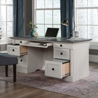 Sauder 65"W Palladia Executive Desk - Glacier Oak-   Lower file drawers with full extension slides hold letter, legal or European size hanging files