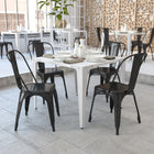 Flash Furniture Commercial Grade Black Metal Indoor-Outdoor Stackable Chair-Plastic Caps on cross brace protect finish when stacked
