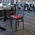 Flash Furniture HERCULES Series Black Window Back Metal Restaurant Chair - Burgundy Vinyl Seat-Welded Joint Assembly