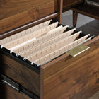 Sauder 59"W Clifford Place L-Desk - Grand Walnut- Grommet holes and pass-through allow convenient paths for cables and cords